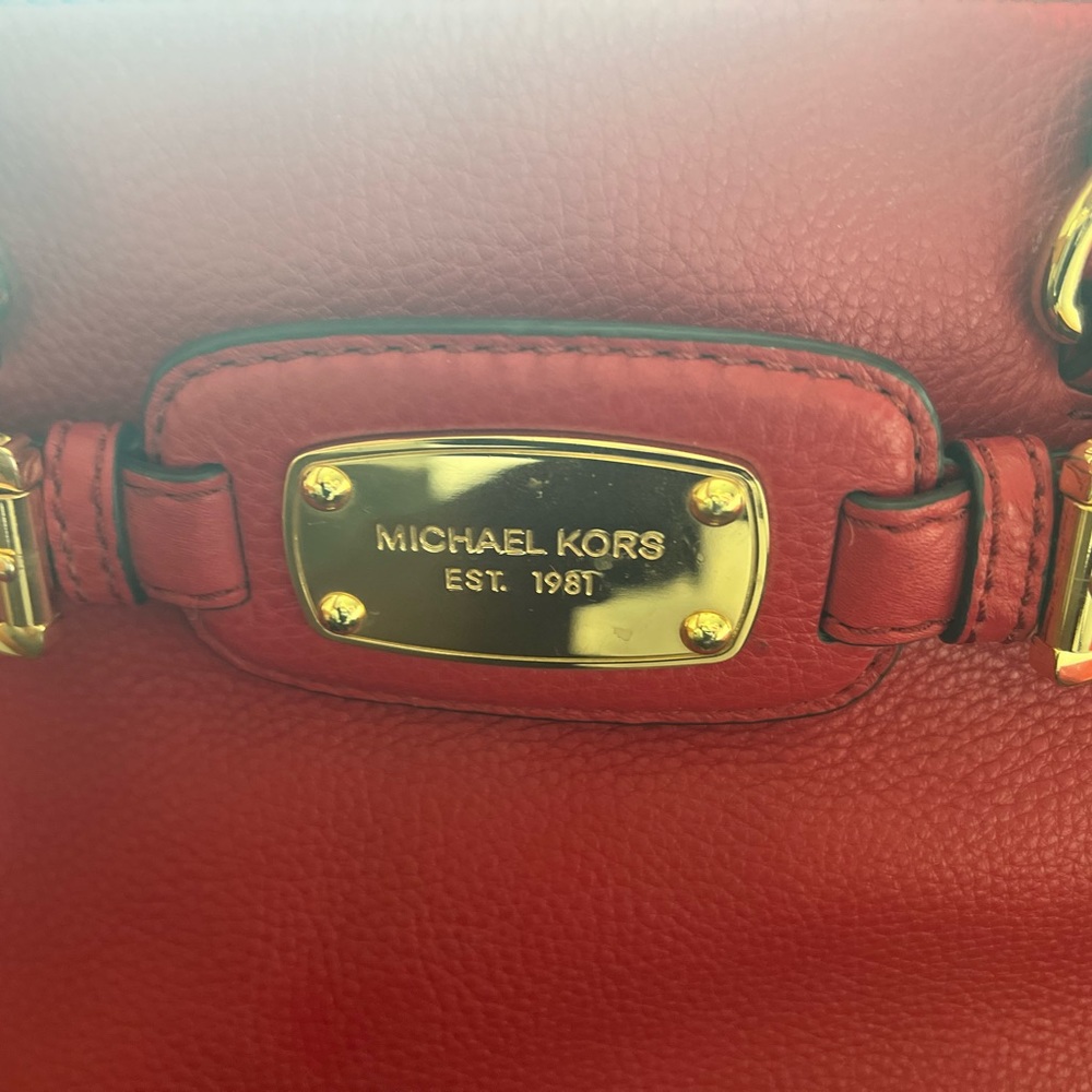 Cute Leather Michael Kors Duffel (Red) with matching wallet. Gold chain accents.